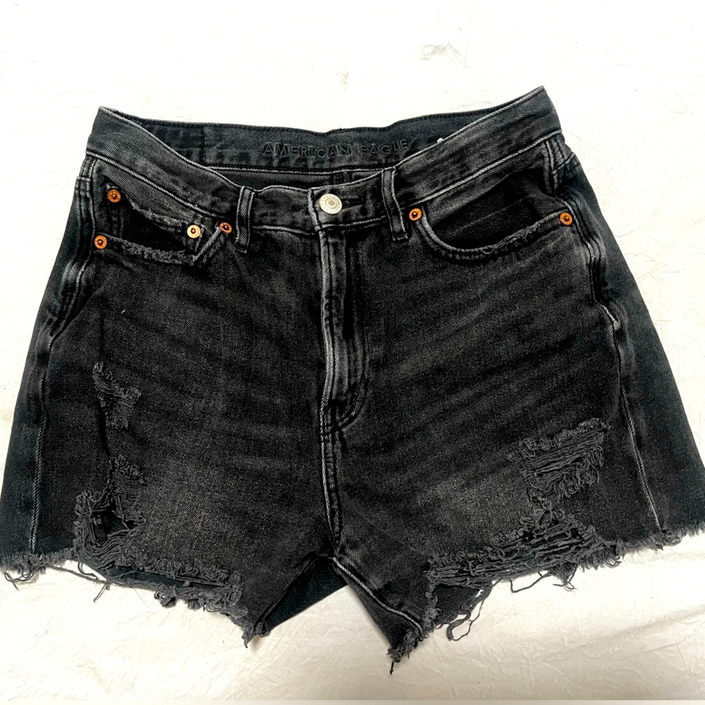 Distressed black jean shorts
